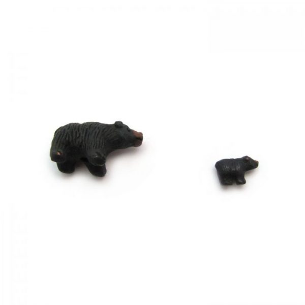 black bear taking a nap and small ceramic beads