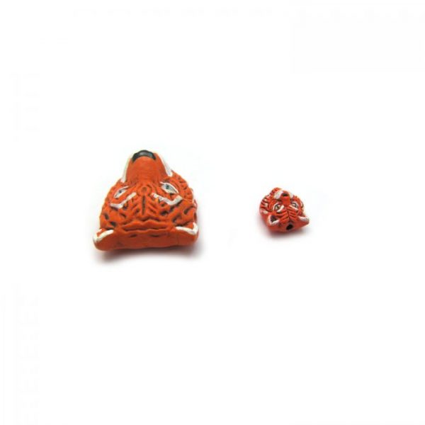 ceramic beads large and small tiger face top view