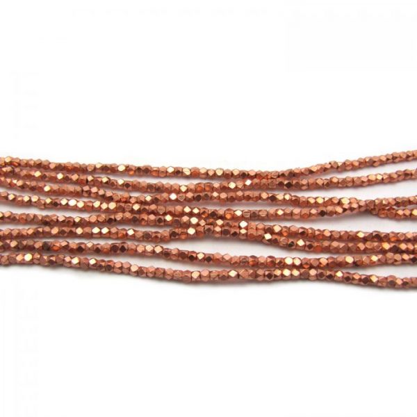 brass faceted nugget beads - copper plated strands