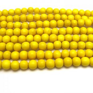 yellow - coloured wood smooth rounds