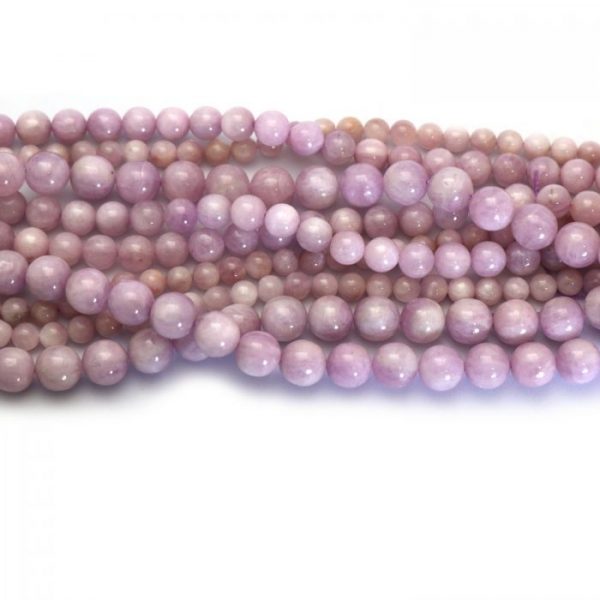 Kunzite strand smooth round stones group image