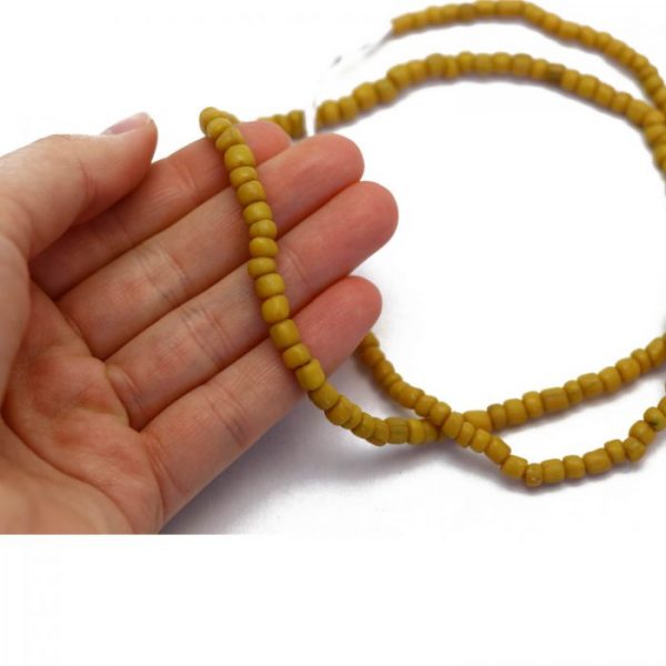 #15 Mustard yellow Indonesian glass beads - showing size