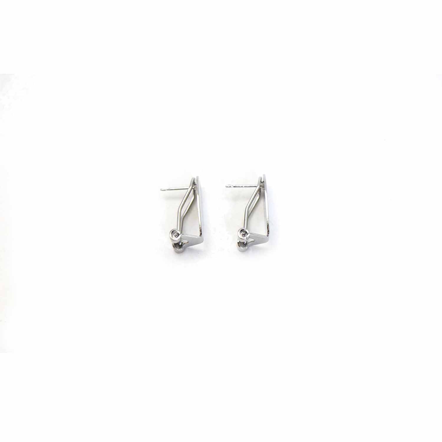 Covet: Tom Binns Bent Nail Earrings - StyleCarrot