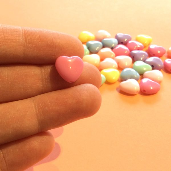 plastic heart beads showing scale