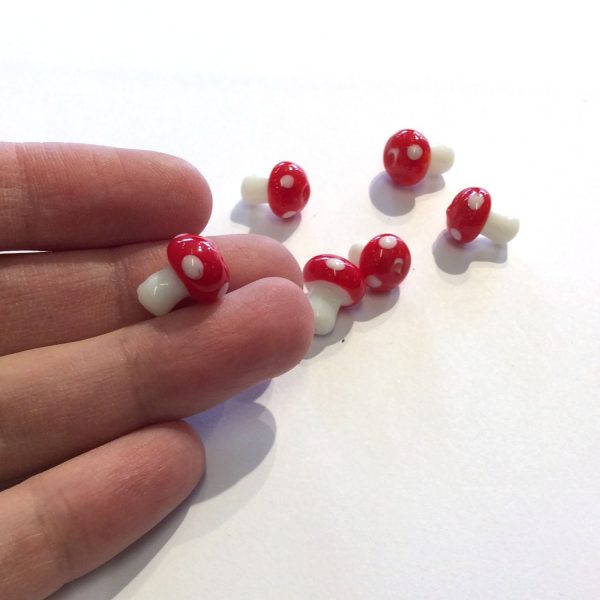 glass mushroom beads showing scale